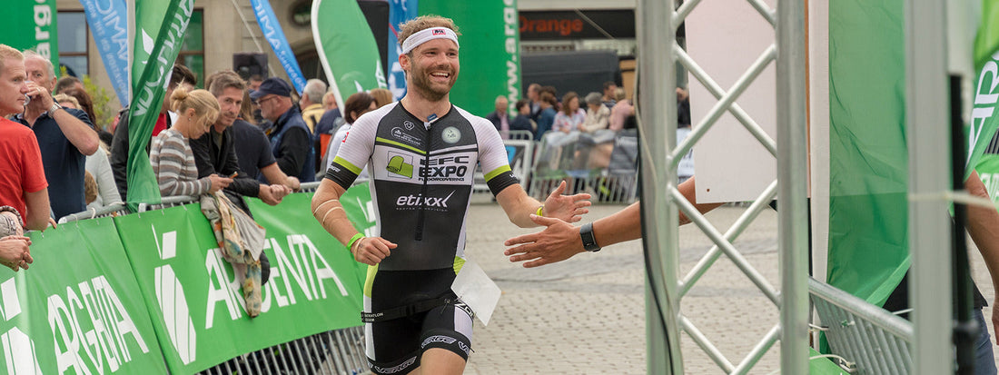 Triathlete approaching the finish line at the TVH Triathlon